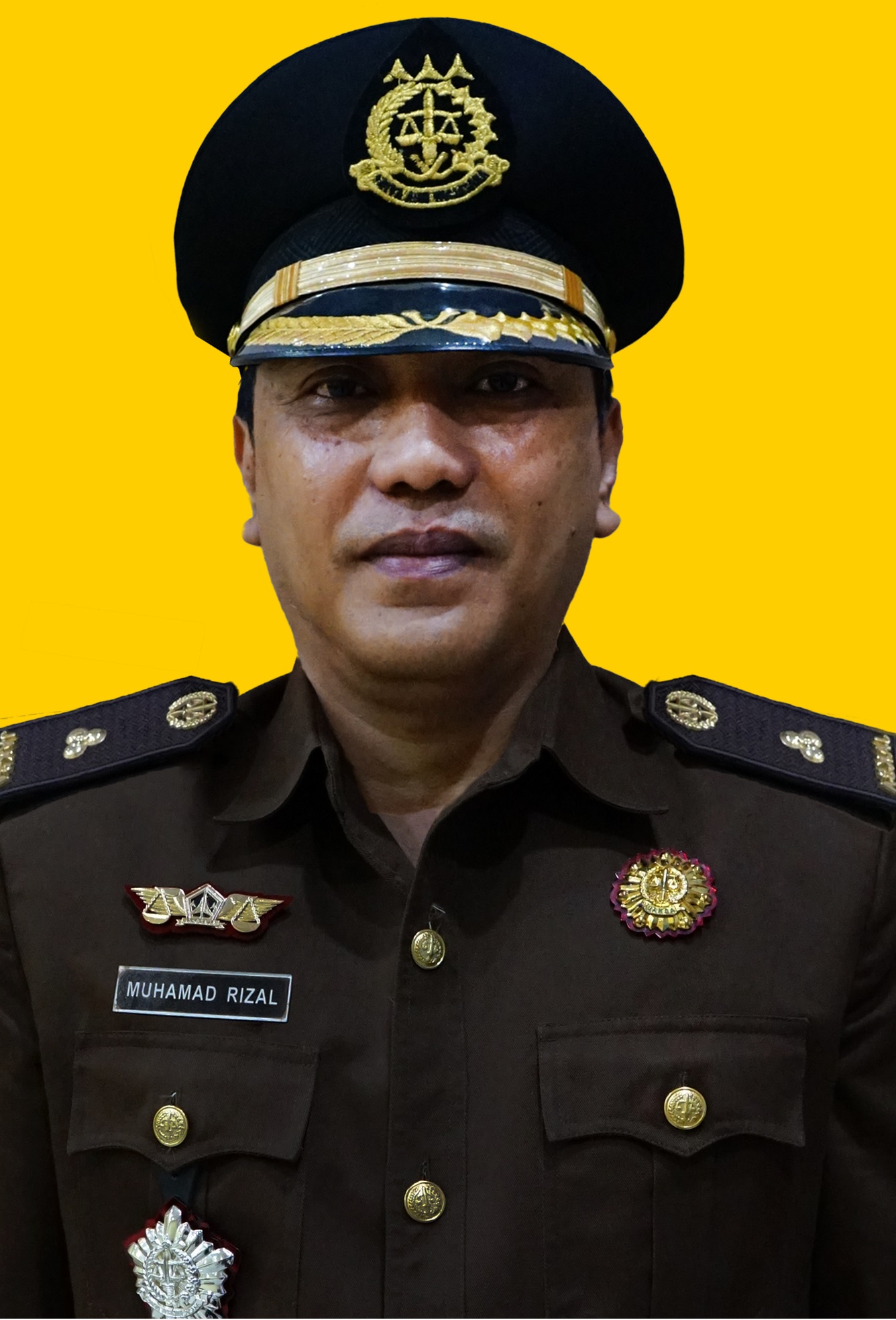 Muhamad Rizal, S.H., M.H.